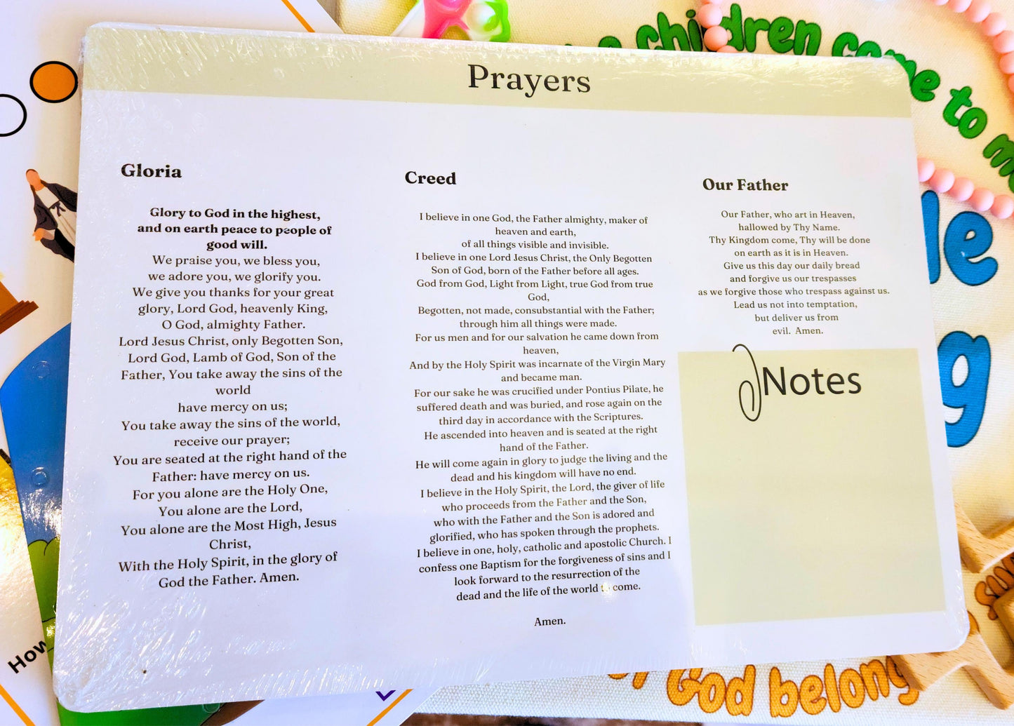 Catholic Mass bag for toddlers with board book, dry-erase board, and fidget toy — Catholic gift from Glory Be Gifts – view 3